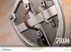 Diverse First 4 Figures - The Legend Of Zelda - Hylian Shield Statue -Spielzeug Puppen Geschäft x f4fbotwhs g